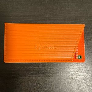 Glossier comb and case